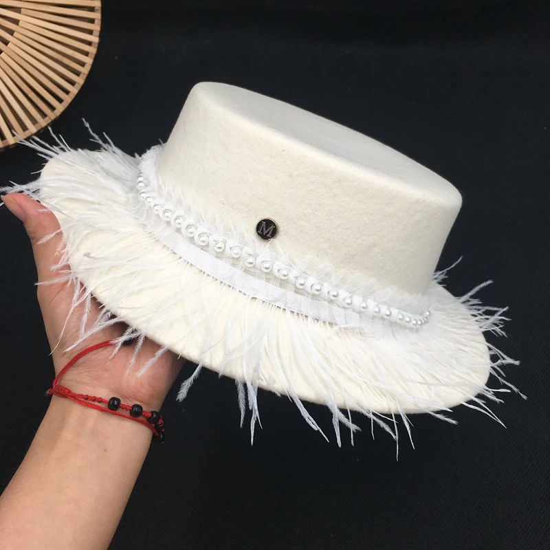 Pure color small hat white elegant aristocratic joker flat-topped about female wool tassels cap han edition autumn/winter ca
Pure color small hat white elegant aristocratic joker flat-topped about female wool tassels cap han edition autumn/winter ca