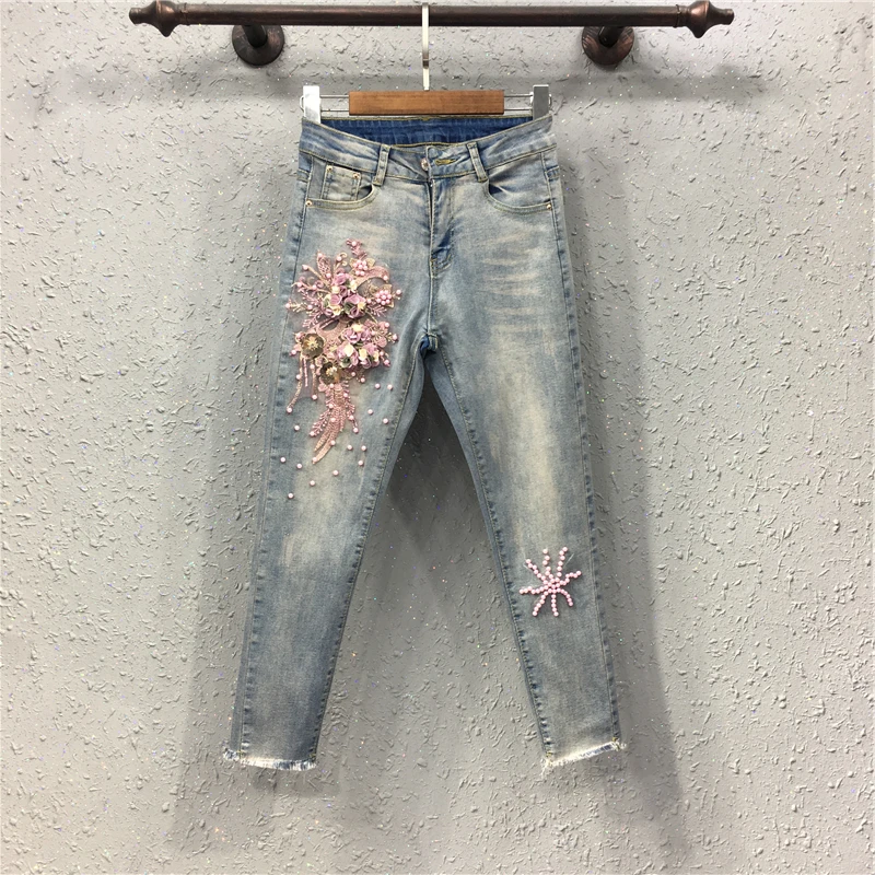 New European nail bead embroidery three dimensional foot flower show thin cowboy pants tight pencil pants
New European nail bead embroidery three dimensional foot flower show thin cowboy pants tight pencil pants