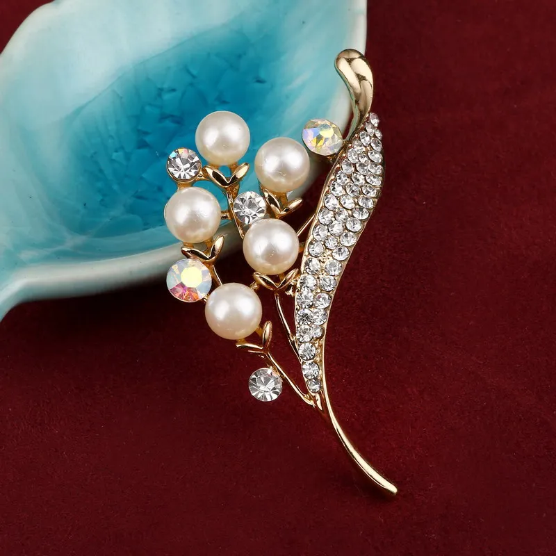 New Elegant Flower Crystal Brooches Simulated Pearl Butterfly Corsage Pins Women Dress Skirt Decoration Gold Filled Broche Gifts
New Elegant Flower Crystal Brooches Simulated Pearl Butterfly Corsage Pins Women Dress Skirt Decoration Gold Filled Broche Gifts