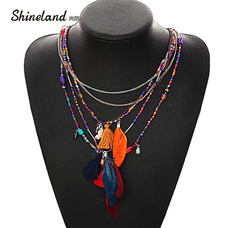 Shineland Multi-Color Feather Necklaces & Pendants Beads Chain Statement Necklace Women Collares Ethnic Jewelry Gifts
Shineland Multi-Color Feather Necklaces & Pendants Beads Chain Statement Necklace Women Collares Ethnic Jewelry Gifts