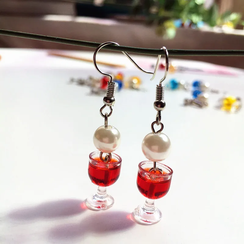 Personality Tiny Red Wine Goblets Dangle Earrings Imitation Pearl Resin Beer Wine Glass Earrings Party Funny Jewelry Crafts
Personality Tiny Red Wine Goblets Dangle Earrings Imitation Pearl Resin Beer Wine Glass Earrings Party Funny Jewelry Crafts