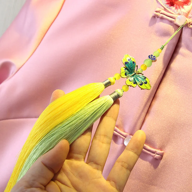 Retro Chinese style female cheongsam Chinese clothing cloisonne butterfly double spike long tassel accessories
Retro Chinese style female cheongsam Chinese clothing cloisonne butterfly double spike long tassel accessories