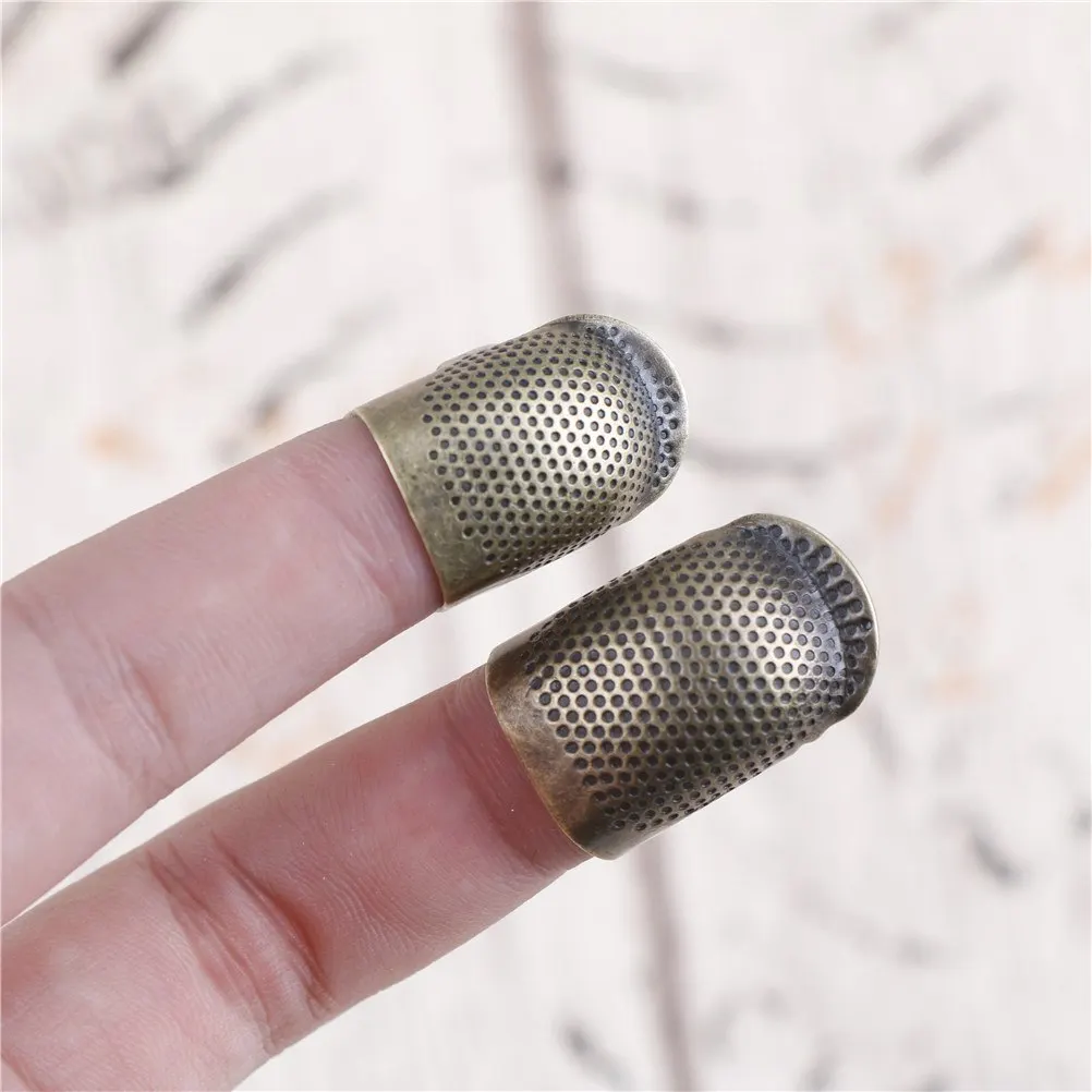 1PCS Size S M Antique Metal Brass Sewing Thimble Needles Finger Protector DIY Helpful Sewing Tools Accessories
1PCS Size S M Antique Metal Brass Sewing Thimble Needles Finger Protector DIY Helpful Sewing Tools Accessories
