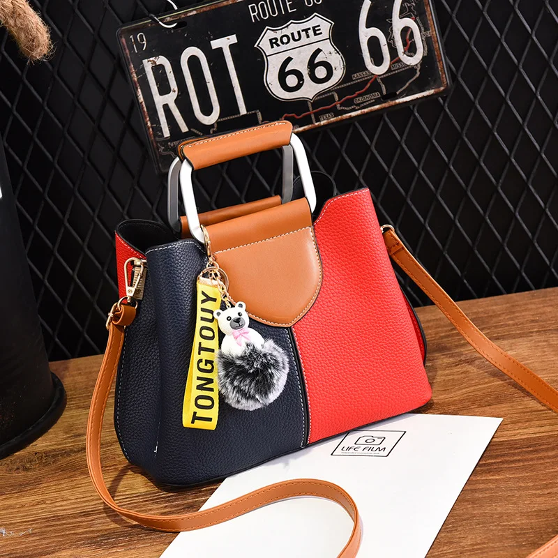 2019 Spring, Summer and Korean version of the new single shoulder crossbody bag stitching hair ball pendant handbag
2019 Spring, Summer and Korean version of the new single shoulder crossbody bag stitching hair ball pendant handbag