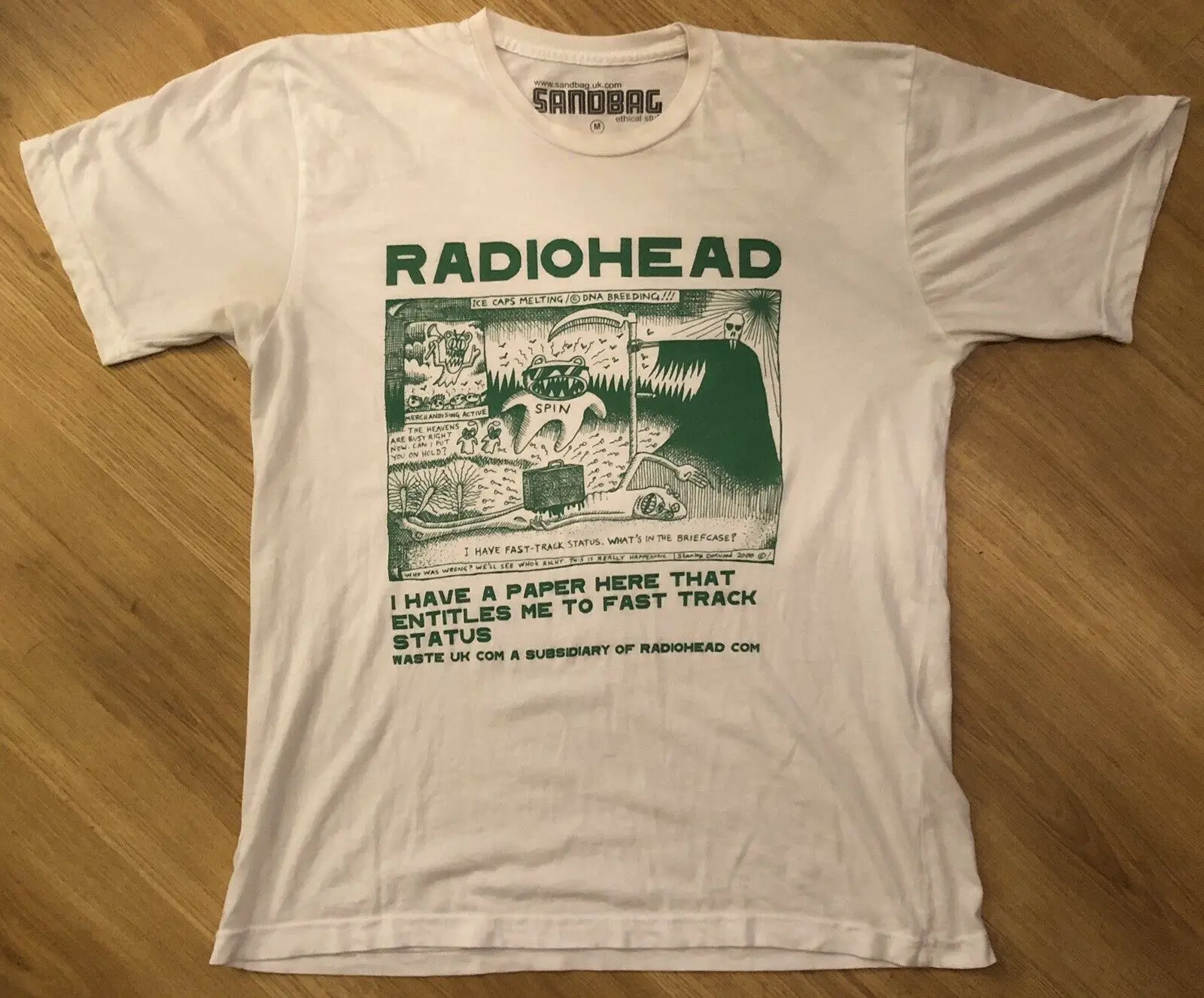 RADIOHEAD “FAST TRACK STATUS” Donwood Official Product Men’s Used T-Shirt Medium
RADIOHEAD “FAST TRACK STATUS” Donwood Official Product Men’s Used T-Shirt Medium
