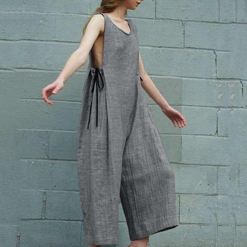 Women Loose jumpsuit Casual Sleeveless Strap Harem Pants solid color summer home holiday beach romper Wide Leg Jumpsuit Overalls
Women Loose jumpsuit Casual Sleeveless Strap Harem Pants solid color summer home holiday beach romper Wide Leg Jumpsuit Overalls