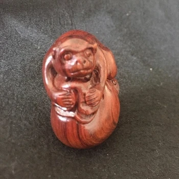 Natural Laotian Huanghua pear carved wooden monkey, monkey ornament
Natural Laotian Huanghua pear carved wooden monkey, monkey ornament