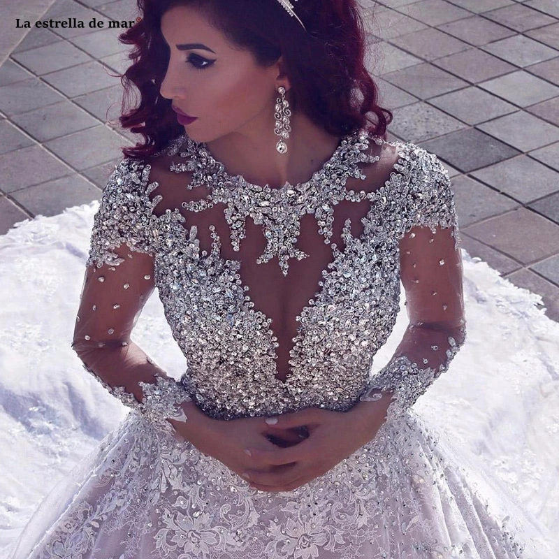 Vestido de noiva2019 new high neck lace crystal see Long Sleeve Muslim Wedding Gowns With Long Train Sequined Lace Wedding Dress
Vestido de noiva2019 new high neck lace crystal see Long Sleeve Muslim Wedding Gowns With Long Train Sequined Lace Wedding Dress