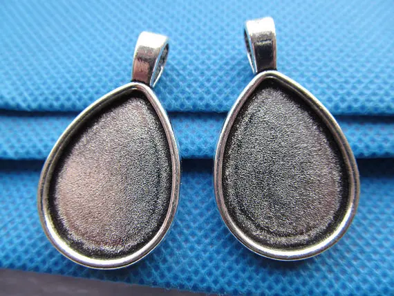 Free Shipping 10pcs Antique Silver/Bronze Raindrop Base Setting Tray Bezel Pendant Charm/Finding,Fit 18mmx25mm Cabochon Cameo
Free Shipping 10pcs Antique Silver/Bronze Raindrop Base Setting Tray Bezel Pendant Charm/Finding,Fit 18mmx25mm Cabochon Cameo