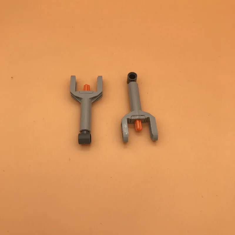 8Pcs/Lot Technic Linear Actuator Mini with Dark Bluish Gray Head and Orange Axle Bricks Parts DIY Toys Compatible with legoing
8Pcs/Lot Technic Linear Actuator Mini with Dark Bluish Gray Head and Orange Axle Bricks Parts DIY Toys Compatible with legoing