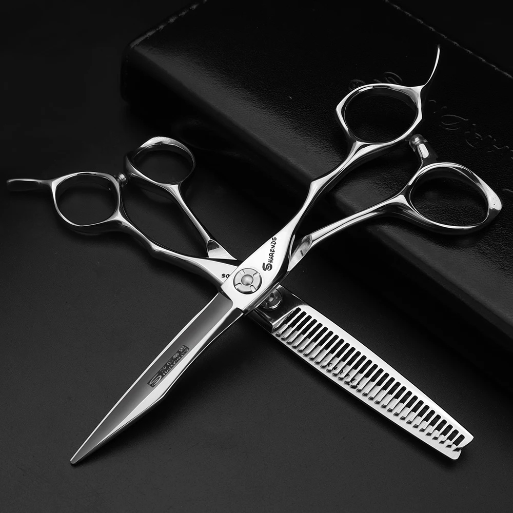 New Japanese hairdressing scissors 6 inch 440c professional hairdressing scissors set fine scissors free gift bag + comb
New Japanese hairdressing scissors 6 inch 440c professional hairdressing scissors set fine scissors free gift bag + comb
