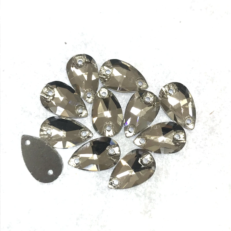 45pcs 7x12mm drop glass sew on rhinestone with two hole white color crystal stone beads flat back machine cut sew-on rhinestones
45pcs 7x12mm drop glass sew on rhinestone with two hole white color crystal stone beads flat back machine cut sew-on rhinestones