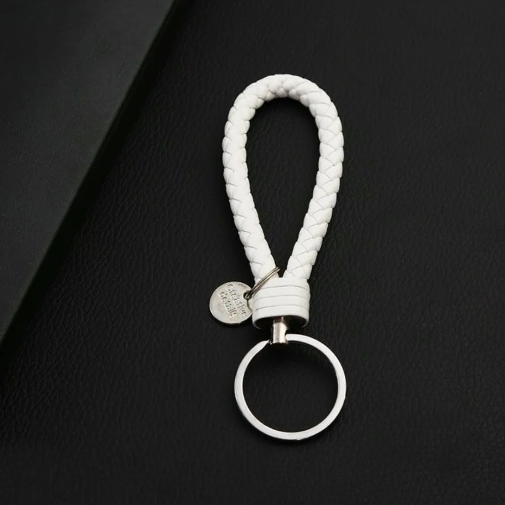 2018 PU hand-woven male and female leather rope key chain couple key ring car key chain small gift
2018 PU hand-woven male and female leather rope key chain couple key ring car key chain small gift