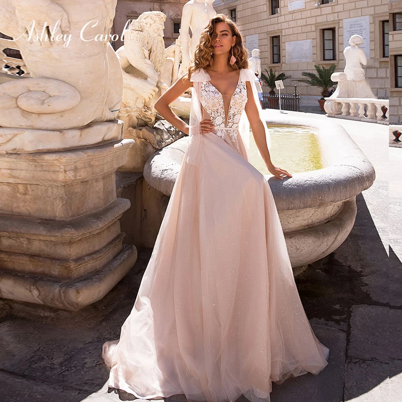 Ashley Carol Appliques A-Line Wedding Dress 2019 Beaded V-neck Lace Sleeveless Court Train Backless Bridal Gown Vestido de Noiva
Ashley Carol Appliques A-Line Wedding Dress 2019 Beaded V-neck Lace Sleeveless Court Train Backless Bridal Gown Vestido de Noiva