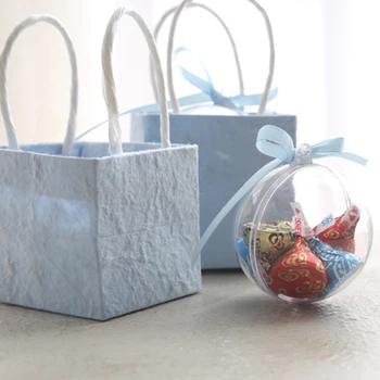 Creative gift bag wedding candy box and paper tote bag hollow ball guests gift box Christening Birthday chocolate box Wrapping
Creative gift bag wedding candy box and paper tote bag hollow ball guests gift box Christening Birthday chocolate box Wrapping