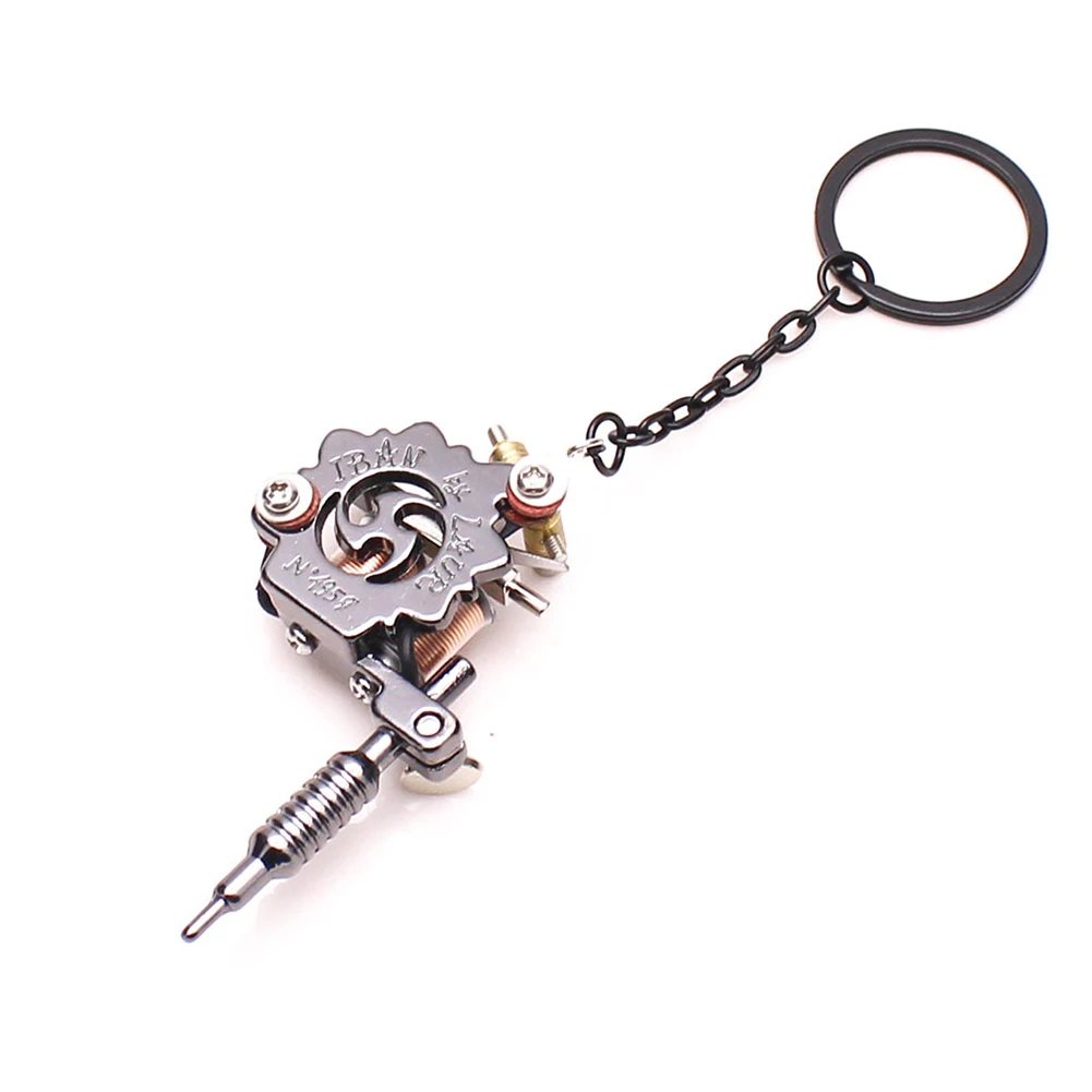 Punk Keychain Portable Mini Tattoo Machine Pendant Key Chain Keyrings Ring Earrings Necklace Ornament For Men Women Gift Crafts
Punk Keychain Portable Mini Tattoo Machine Pendant Key Chain Keyrings Ring Earrings Necklace Ornament For Men Women Gift Crafts