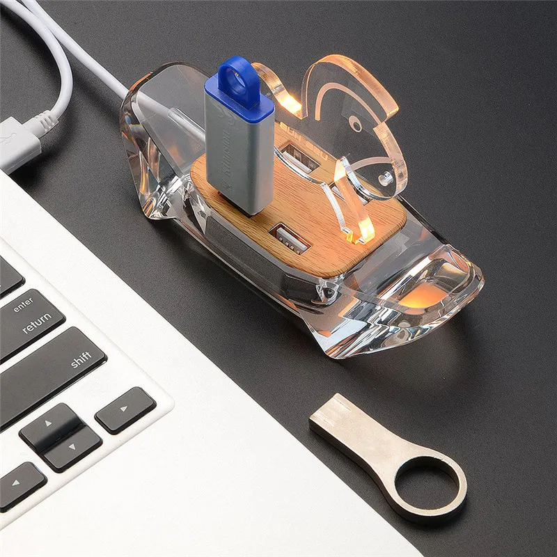 TS-H240 Clear Crystal Trojan Horse Shape 4Ports USB 2.0 Combo Color Changing Light HUB
TS-H240 Clear Crystal Trojan Horse Shape 4Ports USB 2.0 Combo Color Changing Light HUB