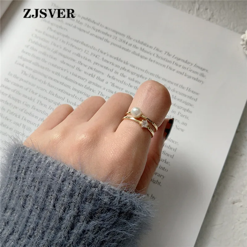 ZJSVER Korean Jewelry 925 Sterling Silver Rings Golden Fashion Double Layer Pearl Zircon Ring For Women Festival Party Present
ZJSVER Korean Jewelry 925 Sterling Silver Rings Golden Fashion Double Layer Pearl Zircon Ring For Women Festival Party Present