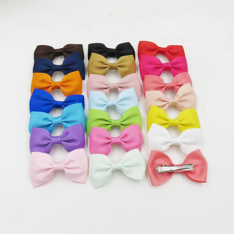 20PCS/Lot Solid Boutique Grosgrain Ribbon Girl Small Bow Elastic Hair Tie Clip Hair Band Bow DIY Hair Accessories Best Gift
20PCS/Lot Solid Boutique Grosgrain Ribbon Girl Small Bow Elastic Hair Tie Clip Hair Band Bow DIY Hair Accessories Best Gift