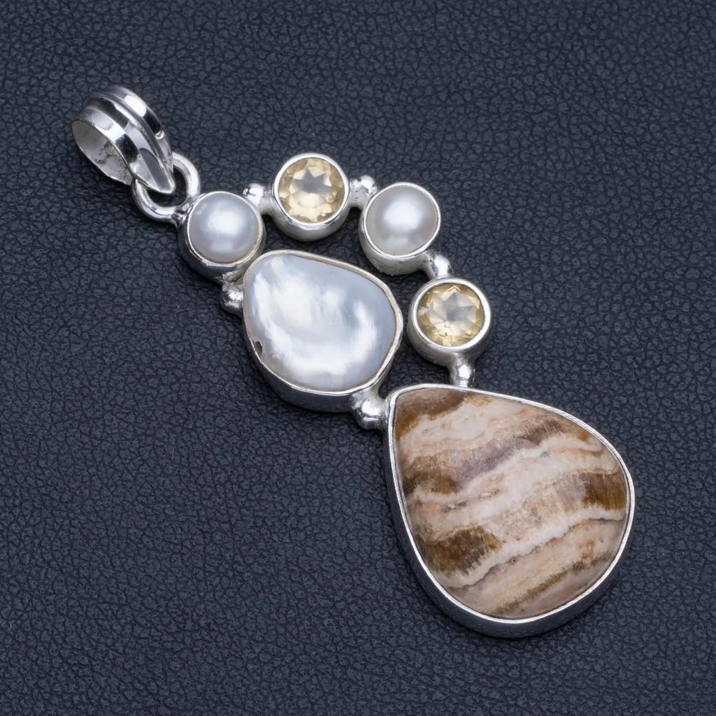 Dragon Septarian,Biwa Pearl,River Pearl and Citrine 925 Sterling Silver Pendant Necklace 2" R1209
Dragon Septarian,Biwa Pearl,River Pearl and Citrine 925 Sterling Silver Pendant Necklace 2" R1209
