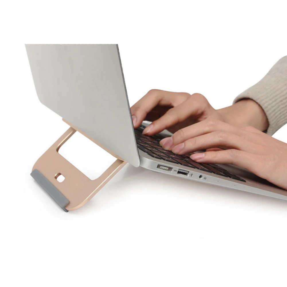 Hot Sale Portable Aluminum Alloy Laptop Stand Desk Dock Holder Bracket Cooler Cooling Pad for MacBook Pro/Air/iPad/Notebook
Hot Sale Portable Aluminum Alloy Laptop Stand Desk Dock Holder Bracket Cooler Cooling Pad for MacBook Pro/Air/iPad/Notebook