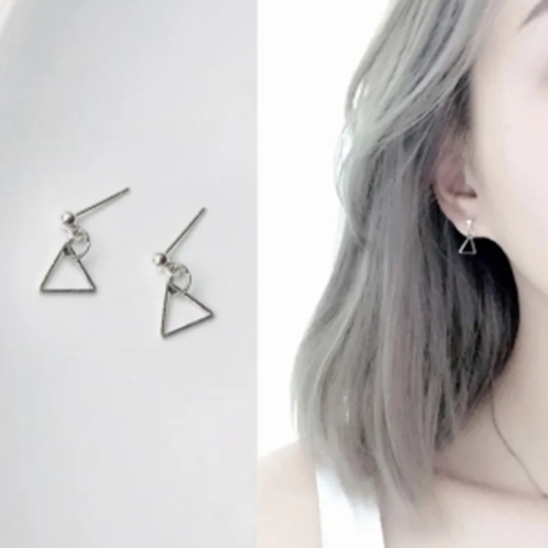 European and American fashion simple hollow triangular geometric anti - allergic female earrings
European and American fashion simple hollow triangular geometric anti - allergic female earrings