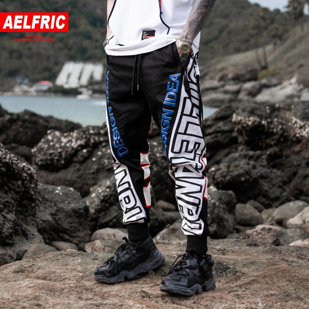 AELFRIC Harem Joggers Men 2019 Spring Summer Casual Pants Big Letter Print Hip Hop Fashion Sweatpants Male Skateboard Sportswear
AELFRIC Harem Joggers Men 2019 Spring Summer Casual Pants Big Letter Print Hip Hop Fashion Sweatpants Male Skateboard Sportswear