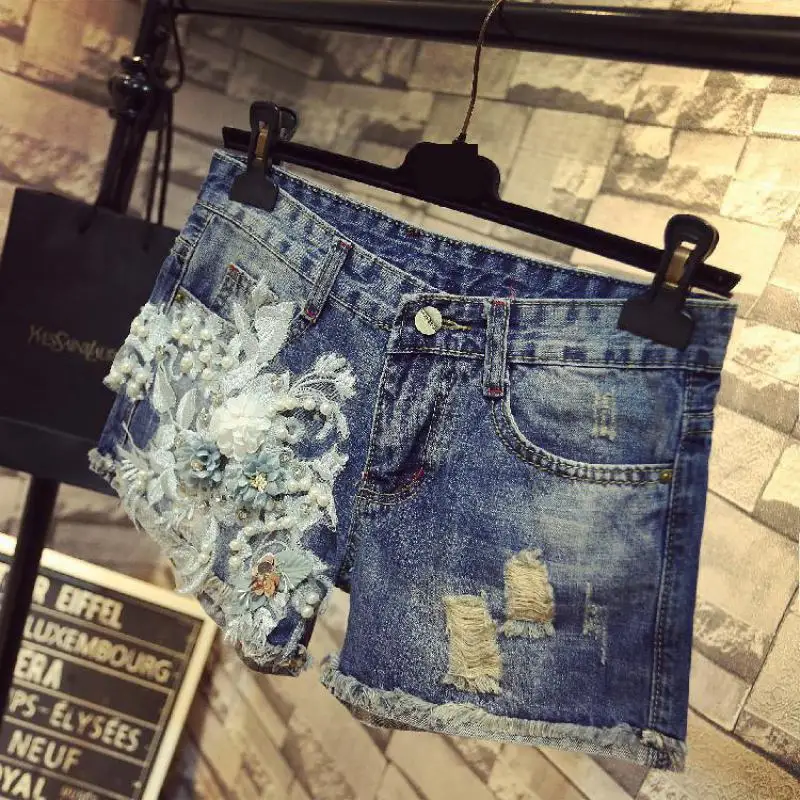 Zuolunouba New Summer Beading Denim Short Lady Embroidery Floral Mid Loose Button Fashion Tassel Holewomen Shorts
Zuolunouba New Summer Beading Denim Short Lady Embroidery Floral Mid Loose Button Fashion Tassel Holewomen Shorts
