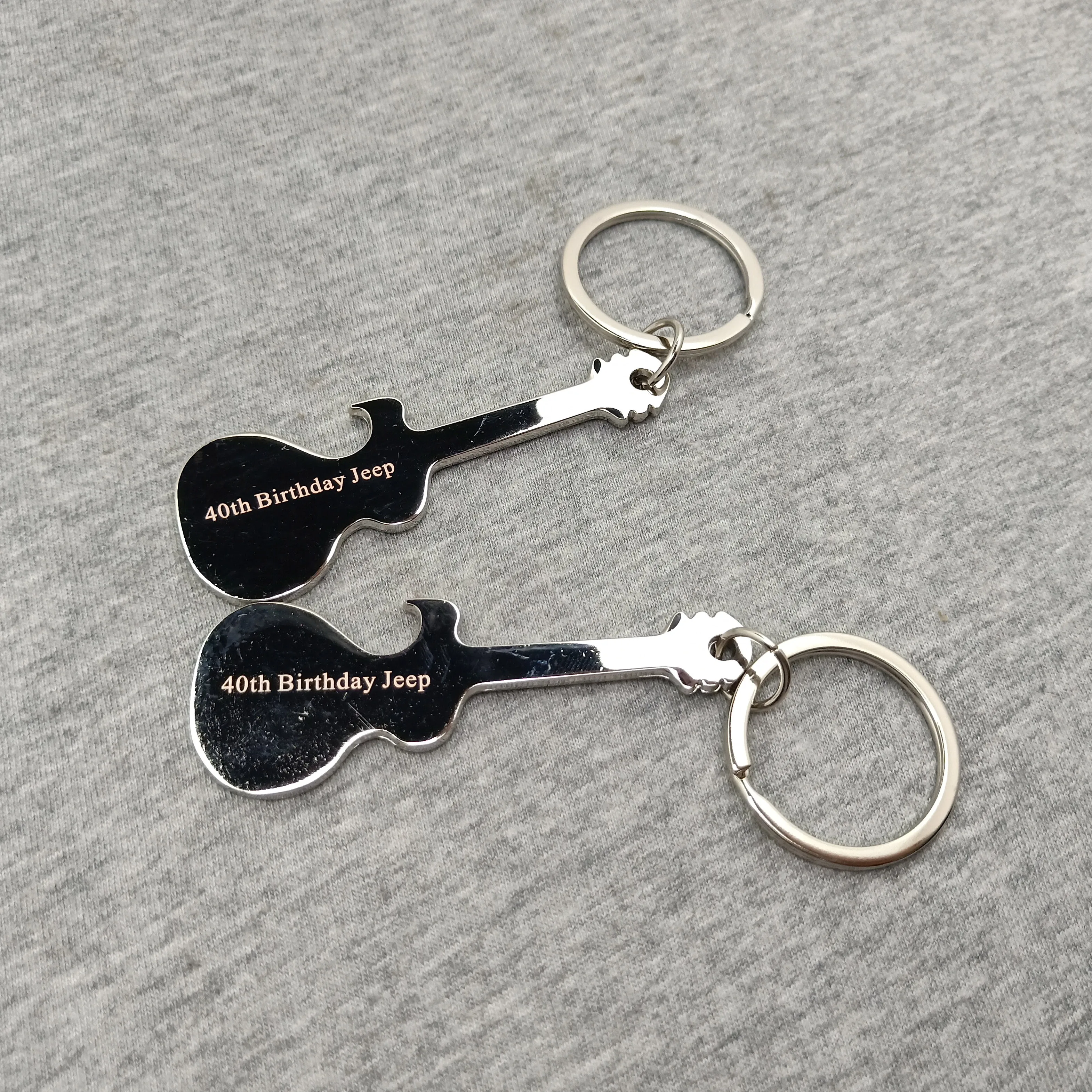 Personalized Guitar opener house Key chain Metal Beer opener Bottle Opener print free with any logo any design and any text
Personalized Guitar opener house Key chain Metal Beer opener Bottle Opener print free with any logo any design and any text