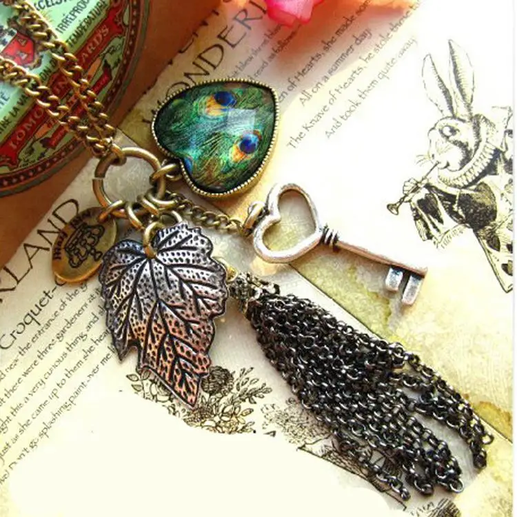 New Fashion Women Vintage Long Sweater Chain Love Heart Peacock Feather Leaves Key Tassel Retro Necklace NL-0714
New Fashion Women Vintage Long Sweater Chain Love Heart Peacock Feather Leaves Key Tassel Retro Necklace NL-0714