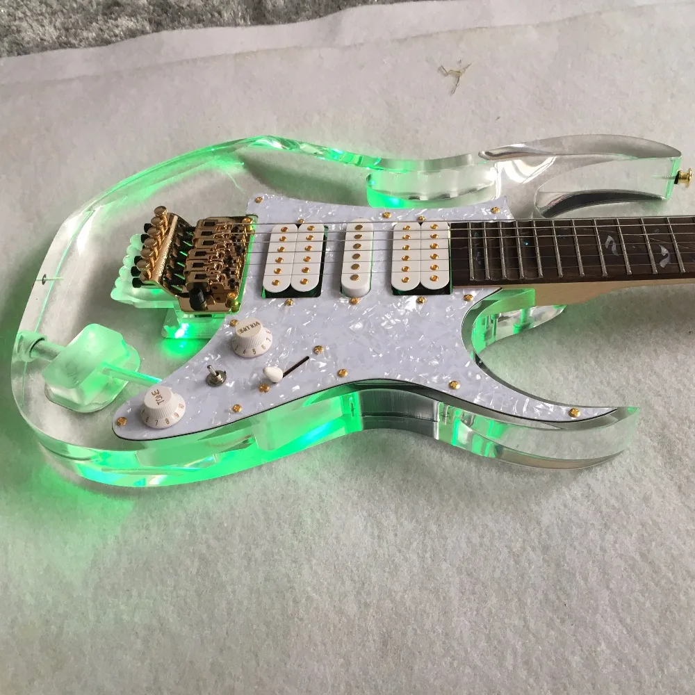 Electric guitar/green LED light guitar/beautiful high quality guitar/customizable
Electric guitar/green LED light guitar/beautiful high quality guitar/customizable