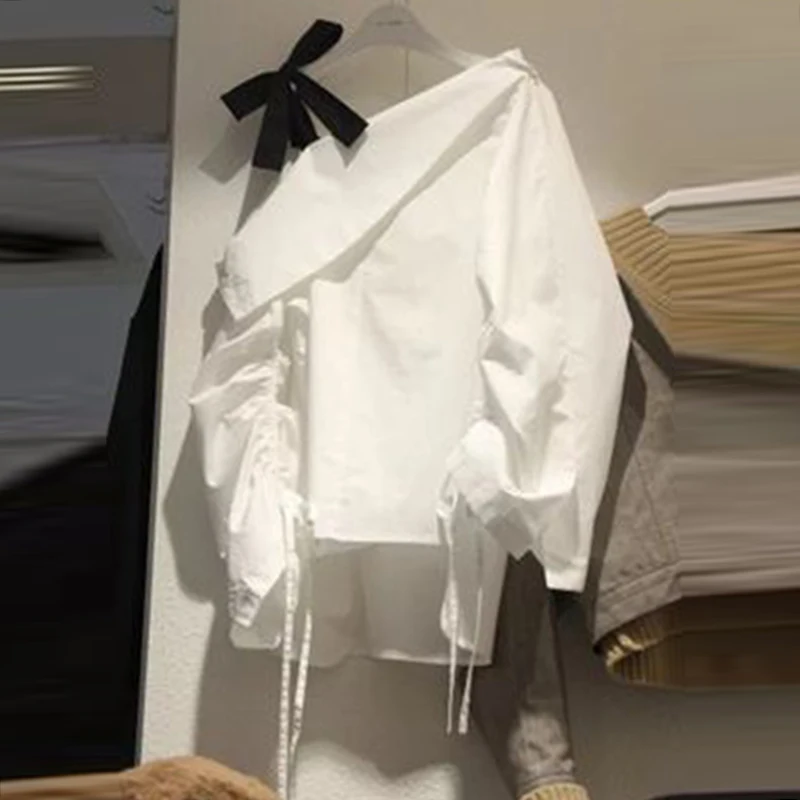 2019 Spring New Korean Elegant Women Shirts Personality Inclined Shoulder Strap Irregular Bow Shirt Casual Shirts
2019 Spring New Korean Elegant Women Shirts Personality Inclined Shoulder Strap Irregular Bow Shirt Casual Shirts