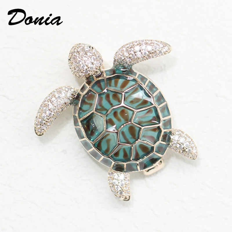 Donia jewelry Fashion cute four-color Enamel micro-inlaid AAA zircon small turtle brooch men and women turtles pin needle
Donia jewelry Fashion cute four-color Enamel micro-inlaid AAA zircon small turtle brooch men and women turtles pin needle