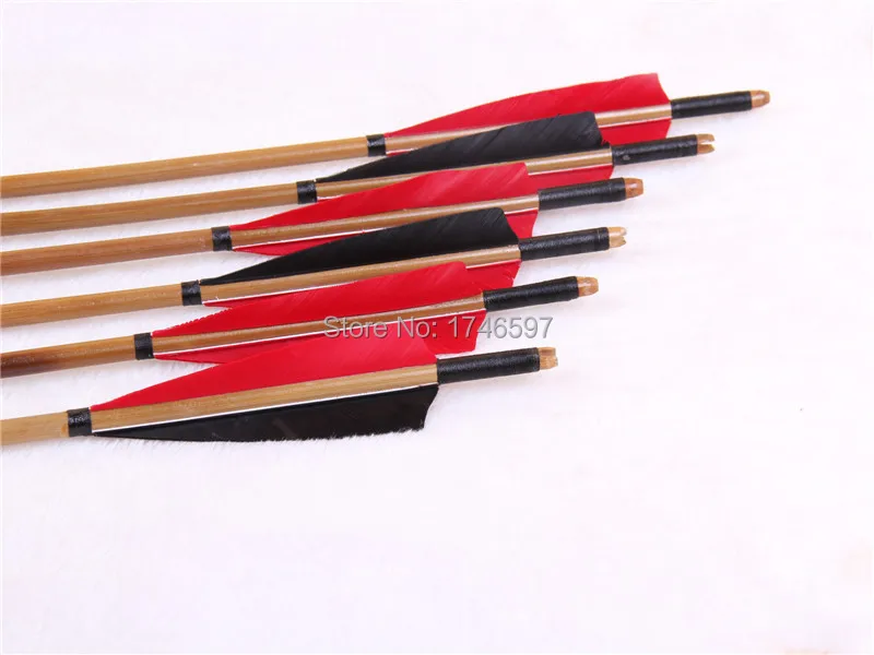12 handmade bamboo arrows with feathers and black and red iron turkey hunting with a bow and arrow Recurve
12 handmade bamboo arrows with feathers and black and red iron turkey hunting with a bow and arrow Recurve