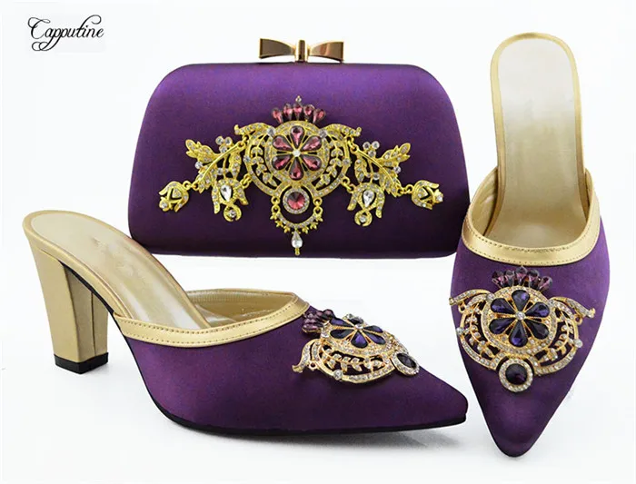 Latest lady sandal pointed toe shoes and evening bag set with stones for lady QSL009 in purple. heel height 9cm
Latest lady sandal pointed toe shoes and evening bag set with stones for lady QSL009 in purple. heel height 9cm