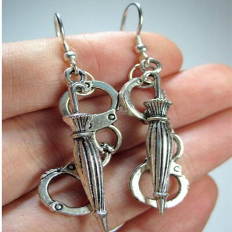 Sherlock Holmes Inspired Brollies and Handcuffs Earrings Silver Tone Criminal Handcuffs umbrella Charm Earrings Women
Sherlock Holmes Inspired Brollies and Handcuffs Earrings Silver Tone Criminal Handcuffs umbrella Charm Earrings Women