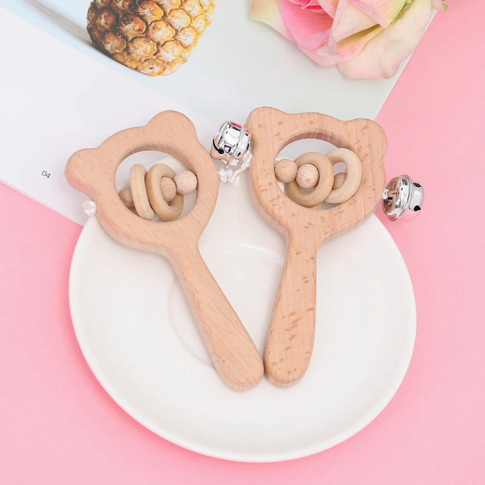 New Wood Baby Teething Ring Beech Bear Hand Rattles Toys Stroller Educational Toys Baby Rattle Nursing Holder Kids Toy
New Wood Baby Teething Ring Beech Bear Hand Rattles Toys Stroller Educational Toys Baby Rattle Nursing Holder Kids Toy