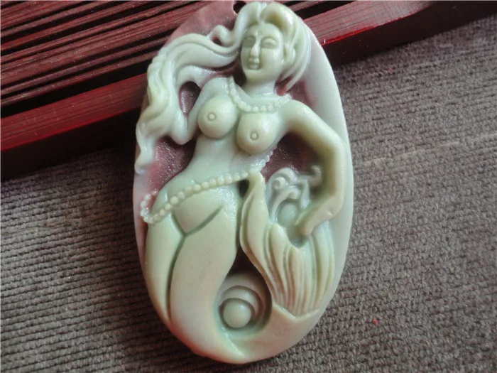 Personality style pure hand-carved mermaid pendant The men and women of style restoring ancient ways
Personality style pure hand-carved mermaid pendant The men and women of style restoring ancient ways