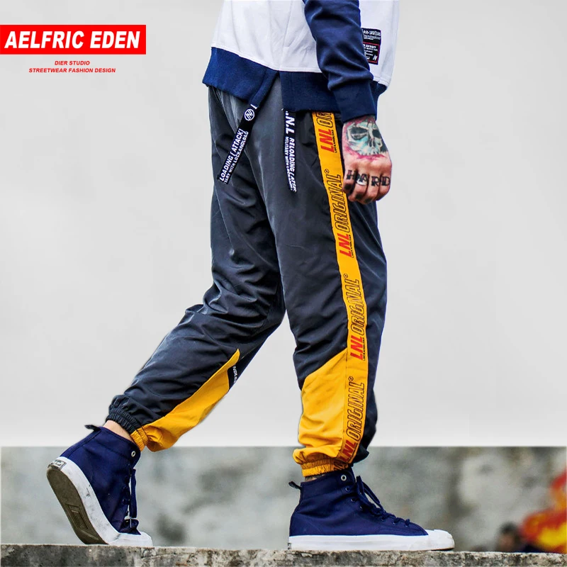 Aelfric Eden New Pants Striped Patchwork Harem Mens Hip Hop Sweatpants Ribbon Casual Joggers Trousers Swag Male Streetwear KJ60
Aelfric Eden New Pants Striped Patchwork Harem Mens Hip Hop Sweatpants Ribbon Casual Joggers Trousers Swag Male Streetwear KJ60