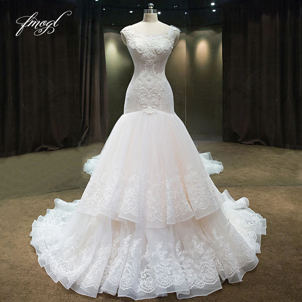 Fmogl Vestido De Noiva Lace Mermaid Wedding Dresses Sexy Illusion Appliques beaded Pattern Tiered Trumpet Bride Gowns
Fmogl Vestido De Noiva Lace Mermaid Wedding Dresses Sexy Illusion Appliques beaded Pattern Tiered Trumpet Bride Gowns