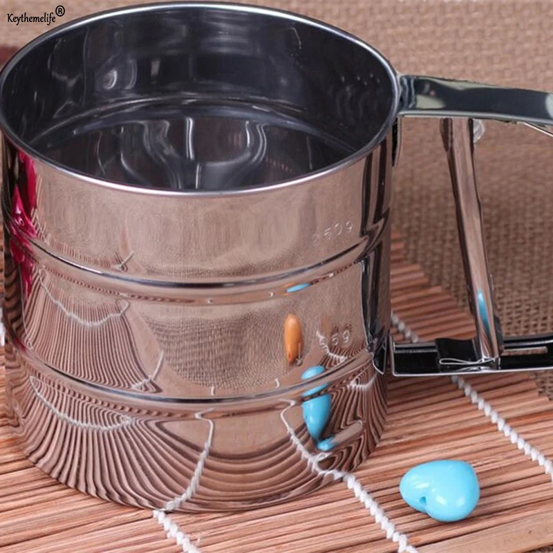 Stainless Steel Mesh Flour Sifter Mechanical Baking Icing Sugar Shaker Sieve Cup Bakeware Baking Pastry Tools D4
Stainless Steel Mesh Flour Sifter Mechanical Baking Icing Sugar Shaker Sieve Cup Bakeware Baking Pastry Tools D4