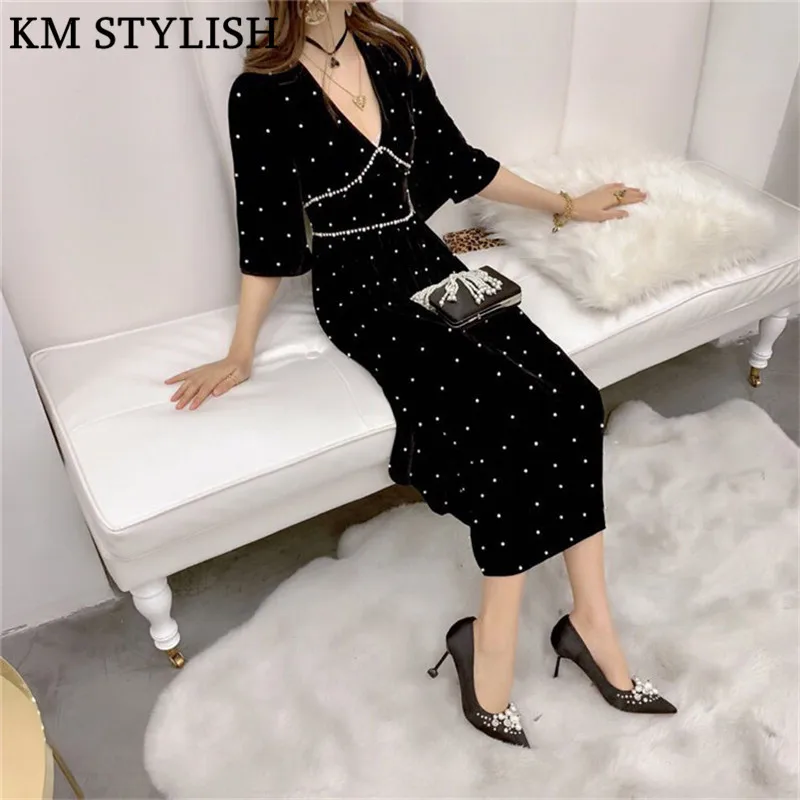 2018 Fall/Winter New Celebrity Temperament V-neck Hand-studded Pearl Half-sleeve Medium Long Velvet Black Dress
2018 Fall/Winter New Celebrity Temperament V-neck Hand-studded Pearl Half-sleeve Medium Long Velvet Black Dress