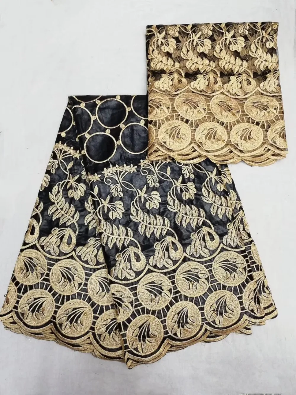 TS009 (5+2yards/set) elegant African bazin lace fabric with delicate black and gold embroidery for party dress
TS009 (5+2yards/set) elegant African bazin lace fabric with delicate black and gold embroidery for party dress