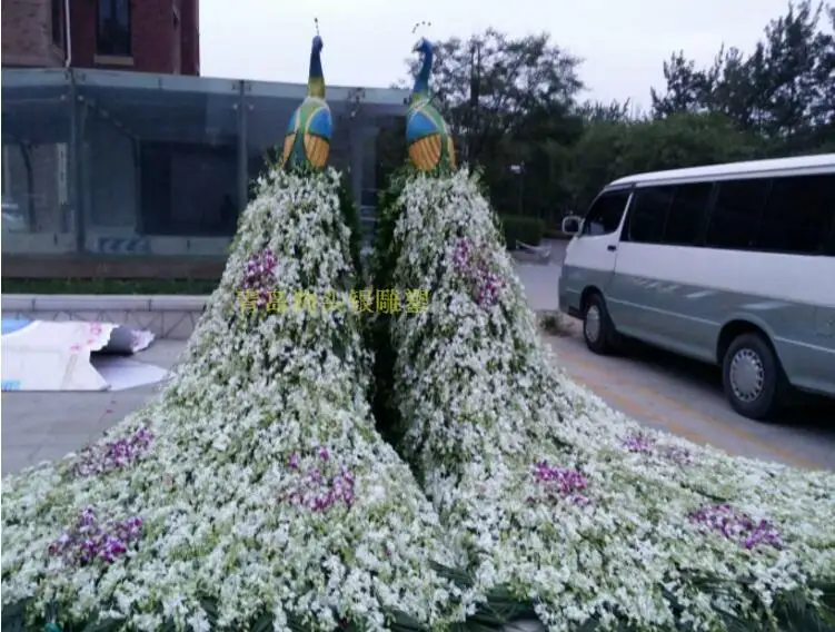 Wedding flower, flower arrangement, foam arrangement, peacock props, wedding ceremony, iron tail bearing, and big flower hanging
Wedding flower, flower arrangement, foam arrangement, peacock props, wedding ceremony, iron tail bearing, and big flower hanging