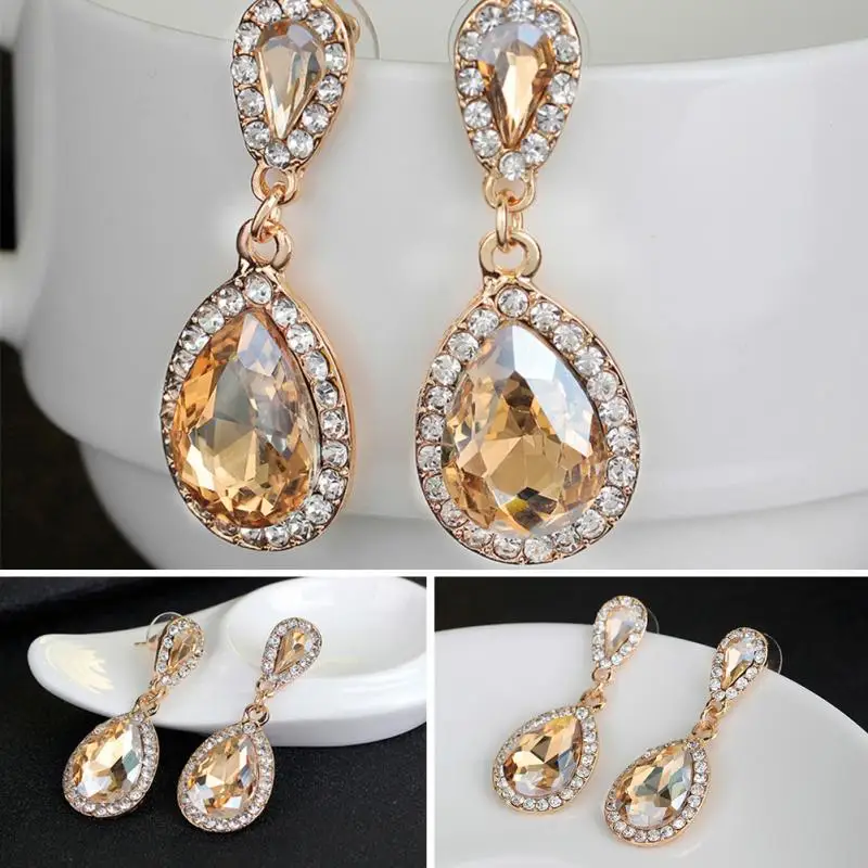 Elegant Fashion Women Hollow Out Champagne Gold Crystal Tear Drop Sparkling Diamante Dangle Earrings for Female Wedding Wearing
Elegant Fashion Women Hollow Out Champagne Gold Crystal Tear Drop Sparkling Diamante Dangle Earrings for Female Wedding Wearing