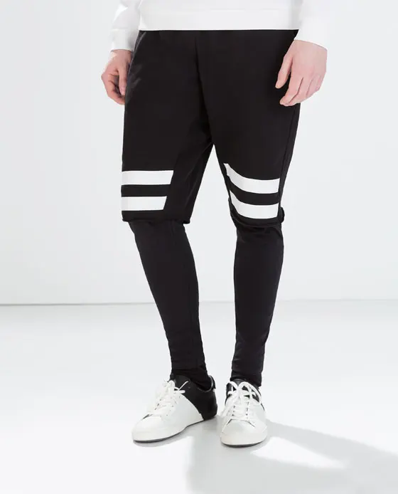 2019 New Men's clothing BIGBANG fashion black white split joint Fake two pieces Knitted harem pants plus size costumes 27-44
2019 New Men's clothing BIGBANG fashion black white split joint Fake two pieces Knitted harem pants plus size costumes 27-44