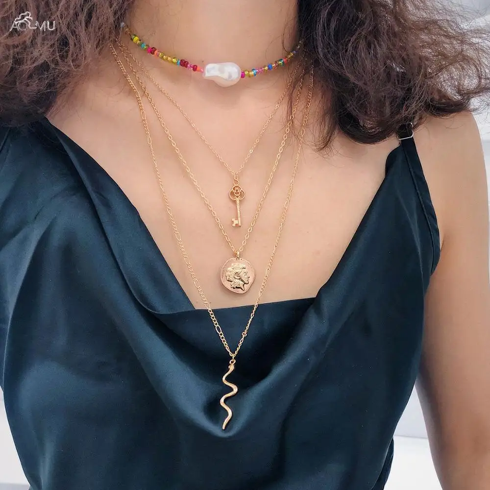 AOMU Multi Layer Colorful Beading Necklace Metal Key Snake Shape Pendant Necklace For Women Geometric Necklace Jewelry
AOMU Multi Layer Colorful Beading Necklace Metal Key Snake Shape Pendant Necklace For Women Geometric Necklace Jewelry