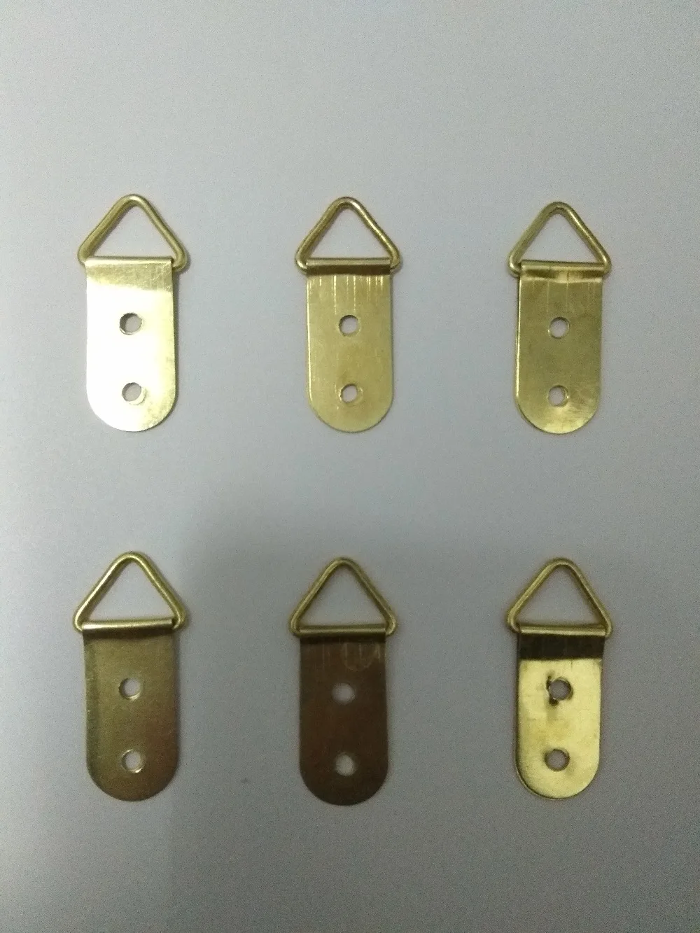 Golden Color Photo Frame Steel Triangle Hook Oil Painting Rings size 4*1.4cm with two nail holes
Golden Color Photo Frame Steel Triangle Hook Oil Painting Rings size 4*1.4cm with two nail holes