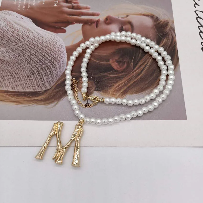 New Korean version of the wind network red star with the letter M pearl necklace small woman temperament wild necklace 1071
New Korean version of the wind network red star with the letter M pearl necklace small woman temperament wild necklace 1071