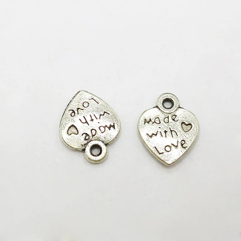50 PC Charm 12*10mm Antique Silver Double Sides Made With Love Heart Charms Jewelry Findings Accessories
50 PC Charm 12*10mm Antique Silver Double Sides Made With Love Heart Charms Jewelry Findings Accessories